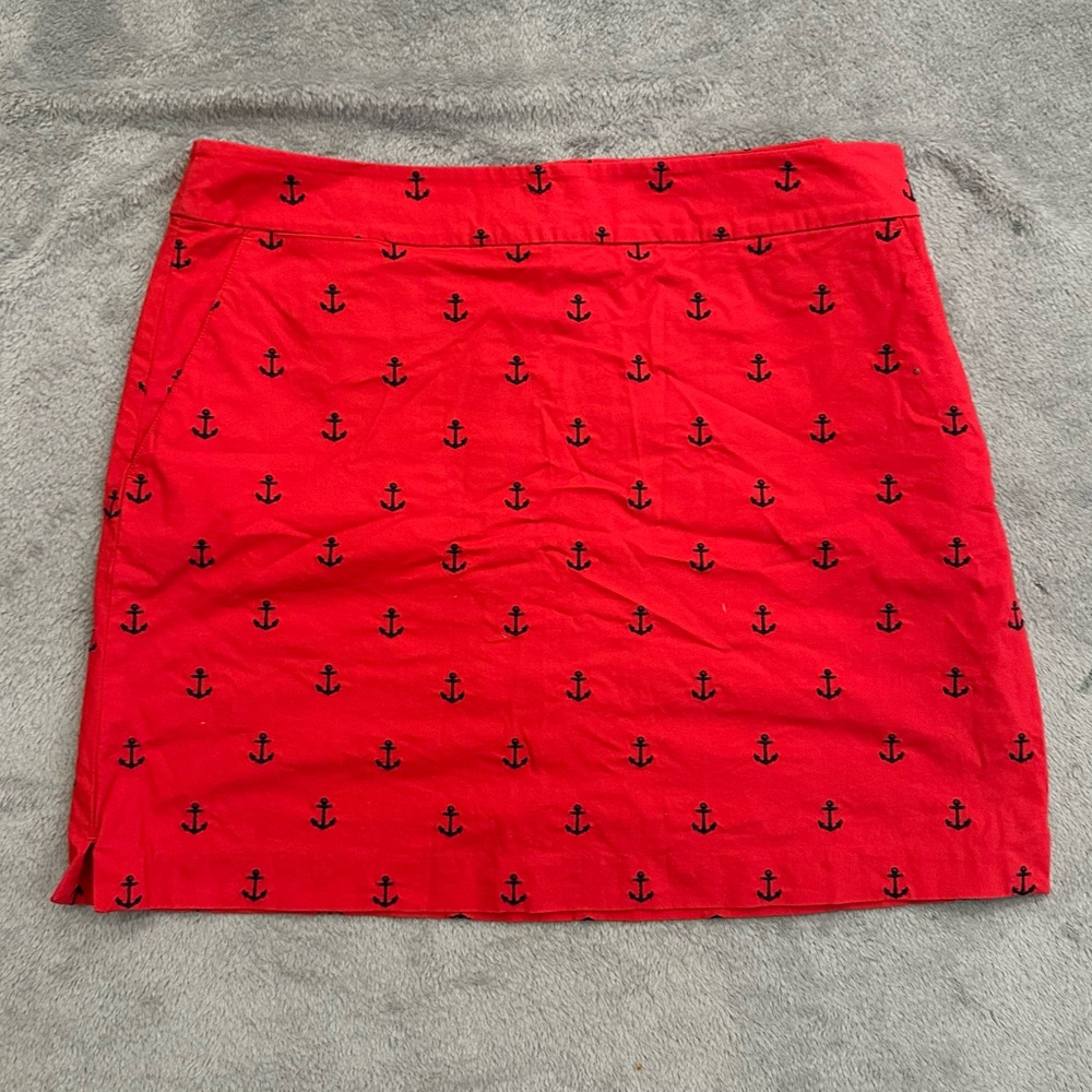 Red Shirt/shorts underneath